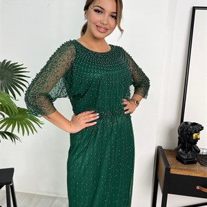 Изумрудное платье это элегантная стилизация для многих