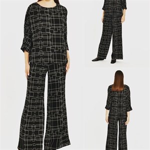 Брючные костюмы прижились в гардеробе большинства