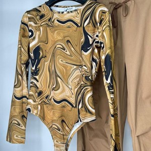 Один из самых удобных и универсальных предметов женской